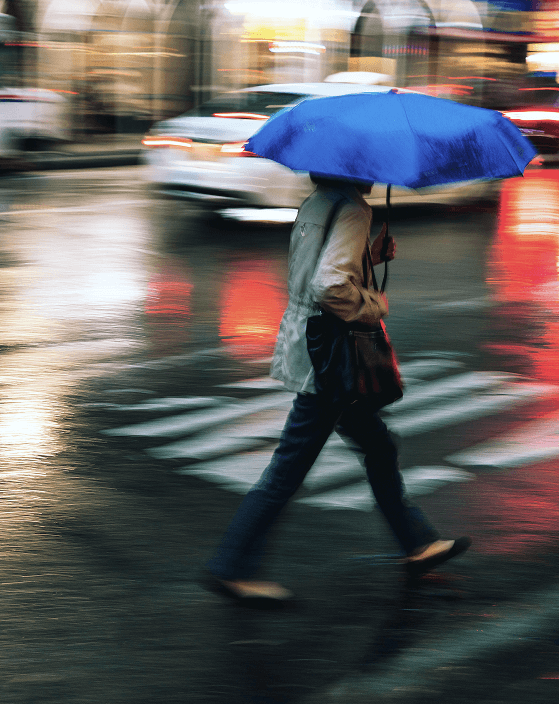 Man with umbrella on the street
